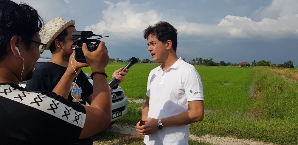 Giving an interview on camera